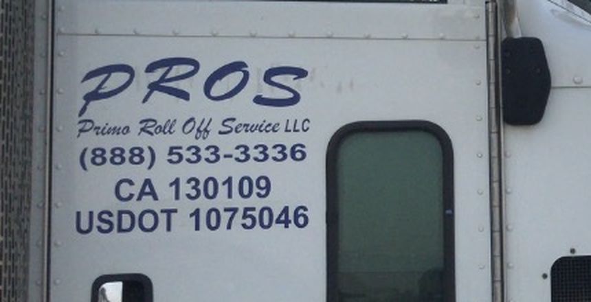 Truck door lettering: PROS, Primo Roll Off Service LLC, (888) 533-3336, CA 130109, USDOT 1075046